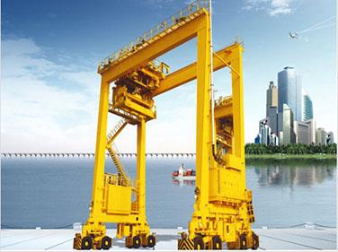 Napreden gumijast posodni portal z vsebino crane.jpg Advanced Performance Rubber-Tyred Container Portal Crane.jpg